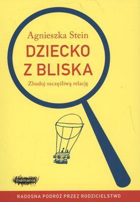 Dziecko z bliska (małe zagięcia rogów kilku kartek)